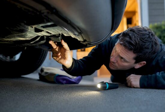 Inspecting vehicle underside for hidden tracker