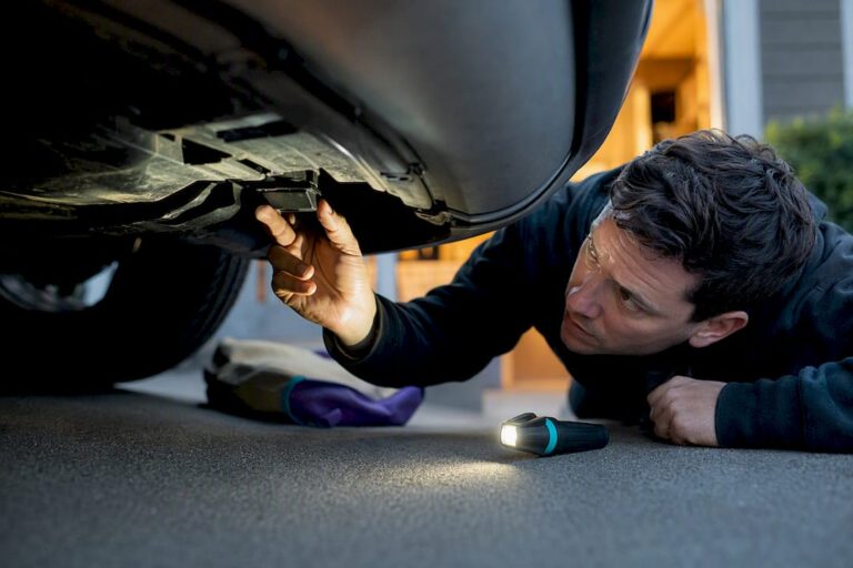 Inspecting vehicle underside for hidden tracker