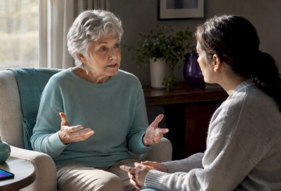 Caregiver and older adult discussing location sharing